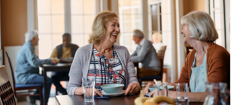 Residents in a senior living dining room