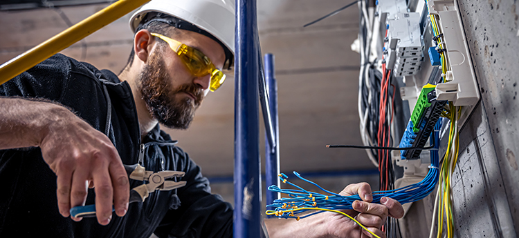 A technician working on structured cabling